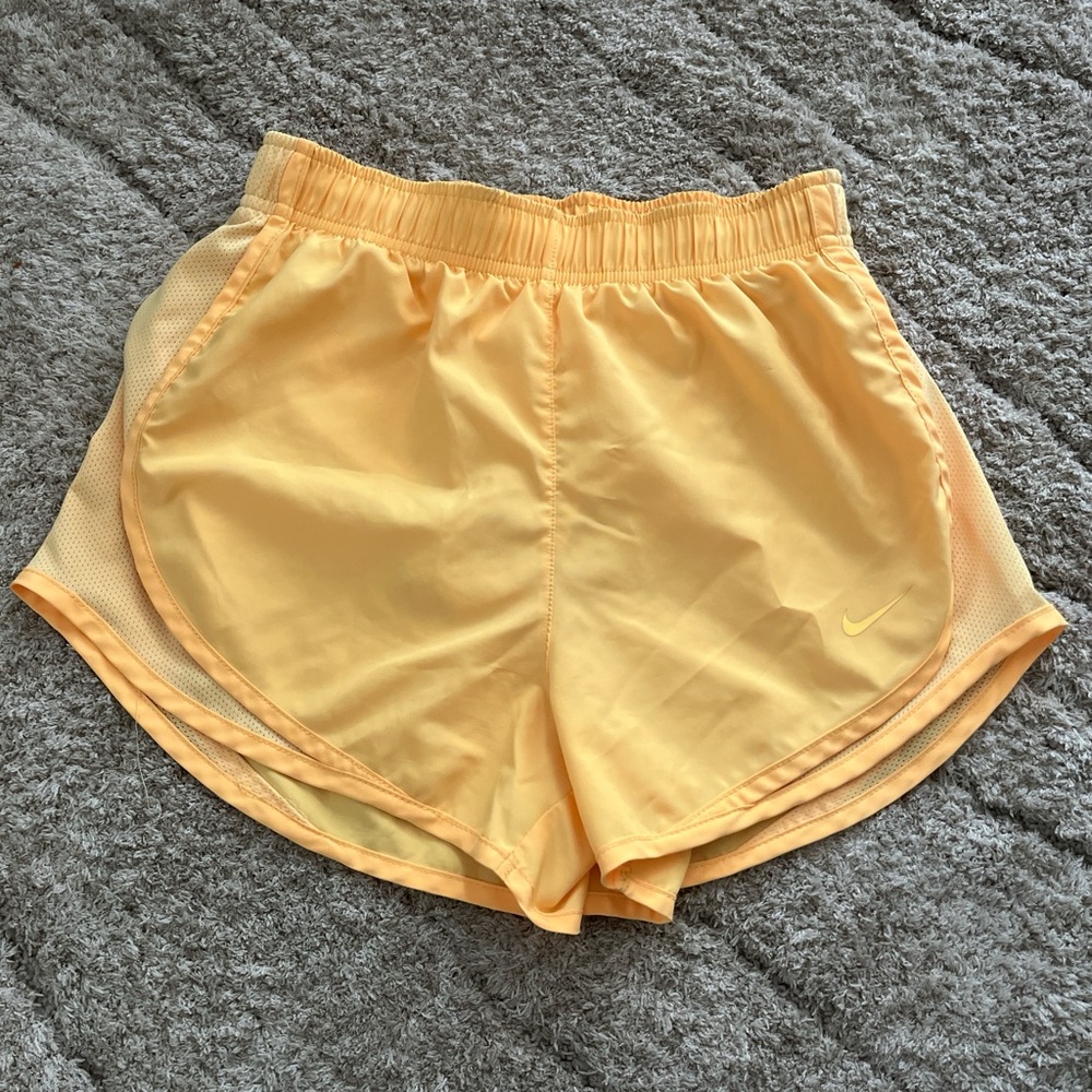 Nike yellow running shorts